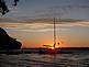 A sailboat is outlined against the setting sun. Taken Saturday at Specht's Ferry on the Mississippi River. by Dawn Pregler.