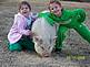 Chloe and Claire with their pet pig, Scampers