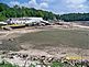 Lake Delhi Dam broke leaving mud and dead fish and clams. Taken August 2010 Delhi, Iowa by Diane Harris.