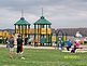 Adults and children enjoying a spring day. Taken April 2011 A.Y. McDonald Park, Dubuque, Iowa.   by Diane Harris.