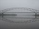 The Julien Dubuque Bridge reflected on to the river on an early, foggy Saturday morning. by Jackie Piper.