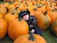 Regan, taken on October 3rd. His first visit to the pumpkin patch with Mom and Dad.