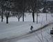 	This is a picture of my 13 year old son, Robby Jones, walking down Nowata Street to play hockey in the ice rink at Allison Henderson.  This was taken after the snow this past weekend.	 