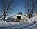 Cattle yard after it was emptied of snow.  It had been blown completely full.		 