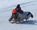 Ron & Kaci Wolf sleigh riding down Ernzen's hill Northeast of Bankston on 2/23/08.  The ride on the sled was a mile at speeds up to 40 mph.  They are sleigh riding on the same hill that Nicky Wolf did over 60 years ago.  Nicky is Ron's Dad and Kaci's