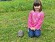 My grandaughter Grace Herrig with a special Blanding turtle we rescued from the highway. Taken 6-13-09 at the nature center in Maquoketa which is where we took the turle after we rescued it by Ann Burns from the nature center.