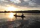 Dave Timmerman and Dena Kurt continue to paddle until the daylight fades. Taken last week in the Peosta Channel by Dawn Pregler.