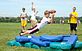 Hempstead's Gage Heffernan (L), Cole Schiltzer & Peter Keleher (R) work with the young receivers . Taken Aug. 4th 2010 Hempstead High School by Mike Waddick.