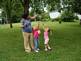 Daughter Melissa and granddaughters Alaina and Adina picking mulburries. Taken 7-1-09 in the backyard by Peggy Driscoll.