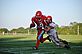 A Dubuque Senior sophomore football (3) player picks up a long gain late against Iowa City High. Taken August 27, 2010 Dalzell Field by Beth Jenn.