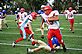 A Dubuque Senior sophomore football player breaks away from the Wahlert defense. Taken September 3, 2010 at the Loras Colege Rock Bowl by Beth Jenn.