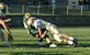 A Wahlert sophomore football player sacks the Hempstead sophomore quarterback for a big loss. Taken September 24, 2010 at Dalzell Field by Beth Jenn.