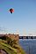 A hot air balloon glides over the Mississippi River in Bellevue. Taken Sept. 5th, 2011 Bellevue, Iowa by Phyllis Blech.