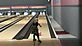 a young youth bowler throwing at an unusual spare. Taken 12/8/12 Creslanes bowling alley by Stephanie Beck.