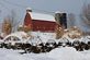 Old Dairy Barn and flower bed covered in snow. Taken Feb 26th Holy Cross, IA  by Susie Williams.