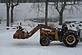 Snowfall in Sageville. Grandkids helping Grandpa Eichman move snow.