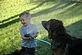 Race, our grandson, and Hannah playing with the hose. Taken 8/27/2010 Our backyard by Lori.