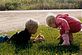 Kids looking for bugs in Grandma's yard. Taken 2009 Peosta, IA by Donna Kalb.