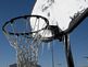 An icy basketball hoop waits for spring. Taken Thanksgiving Day Dubuque County by Laurie Helling.