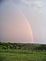 Rainbow over Dubuque. Taken may of 2008 looking out from the Walmart parking lot after a tornado warning had expired by Paula Schumacher.