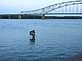 Julien Dubuque Bridge by River walk in high water.