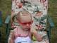 Nora with her cool shades. Taken July 3rd Dubuque fireworks by mom.