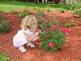 Taylor Mae learning to stop and smell the roses.