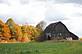 A barn against the backdrop of  fall colors. Taken August 7, 2008 In Wisconsin by Tara Grace.